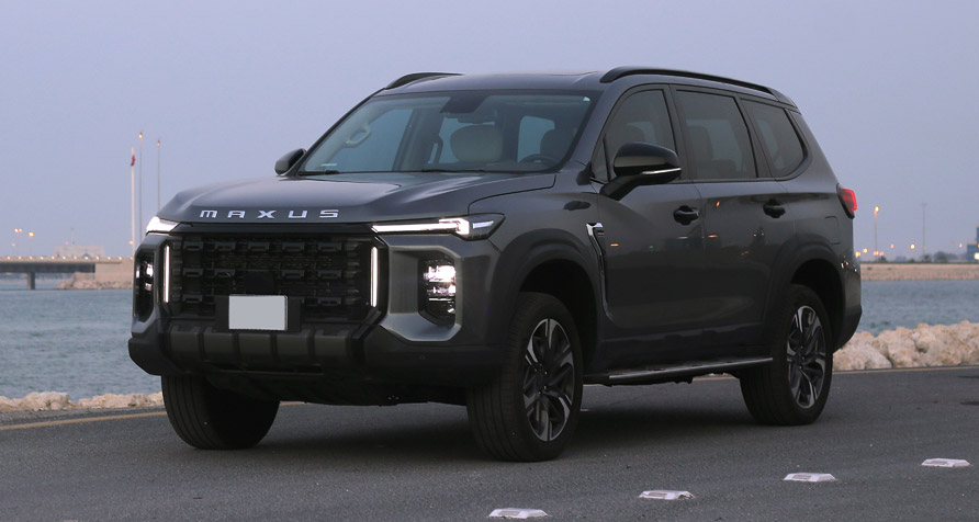 SUV on desert terrain: Maxus D90 Max driving confidently through Bahrain's desert landscape.