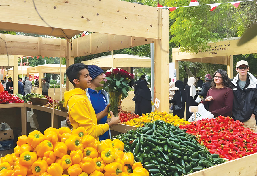 Visitors exploring local produce at Bahrain Farmers Market
