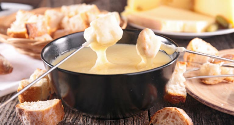 Swiss cheese fondue at Mövenpick Hotel Bahrain Gallery Lobby Lounge
