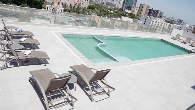 Rooftop pool and dining at The Jewel Hotel