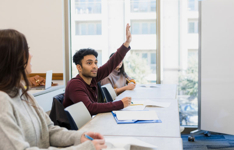 Mr. Ramadan teaching Arabic to second-language learners
